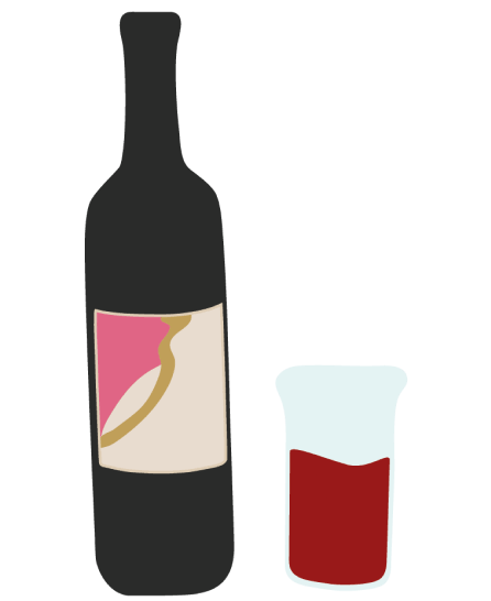 A bottle of red wine beside a filled glass