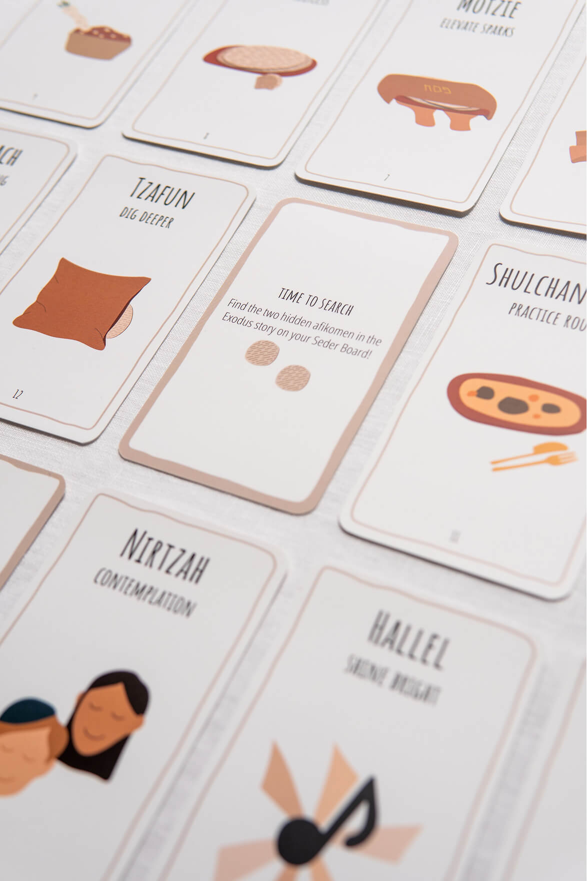 Close-up of the Time To Search card held above the Seder board