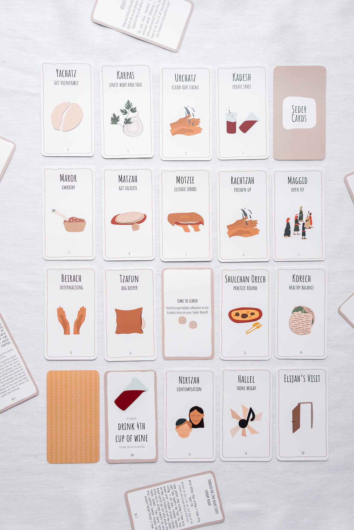 The full set of Seder Cards laid out in rows