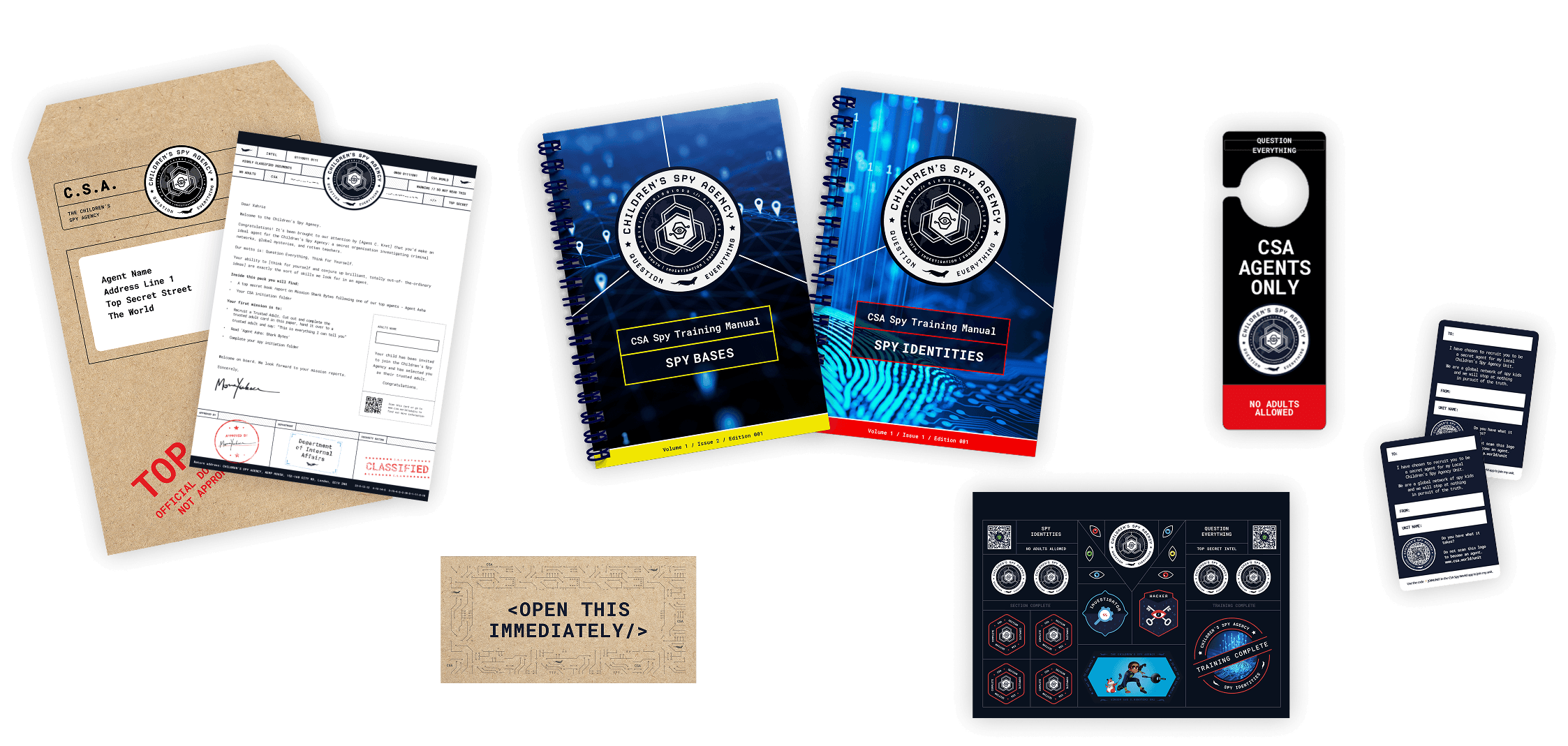 Flat lay of the Expansion Pack contents: two more CSA training manuals covering spy bases and spy identities, plus a welcome letter, door hanger, recruitment cards and sticker sheet